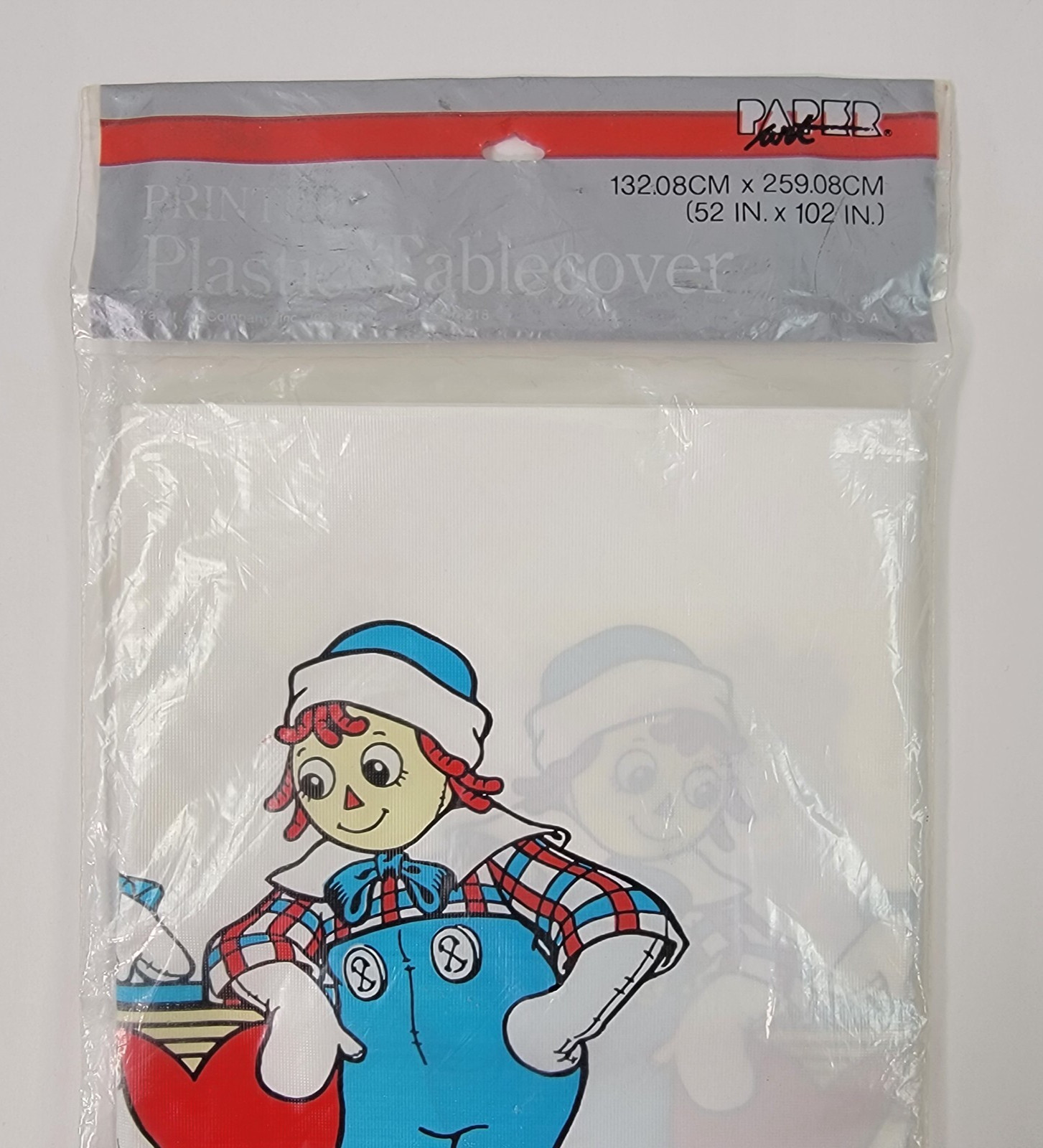 Vintage Paper Art 1988 Raggedy Ann & Raggedy Andy Plastic Tablecloth 54 x 102″