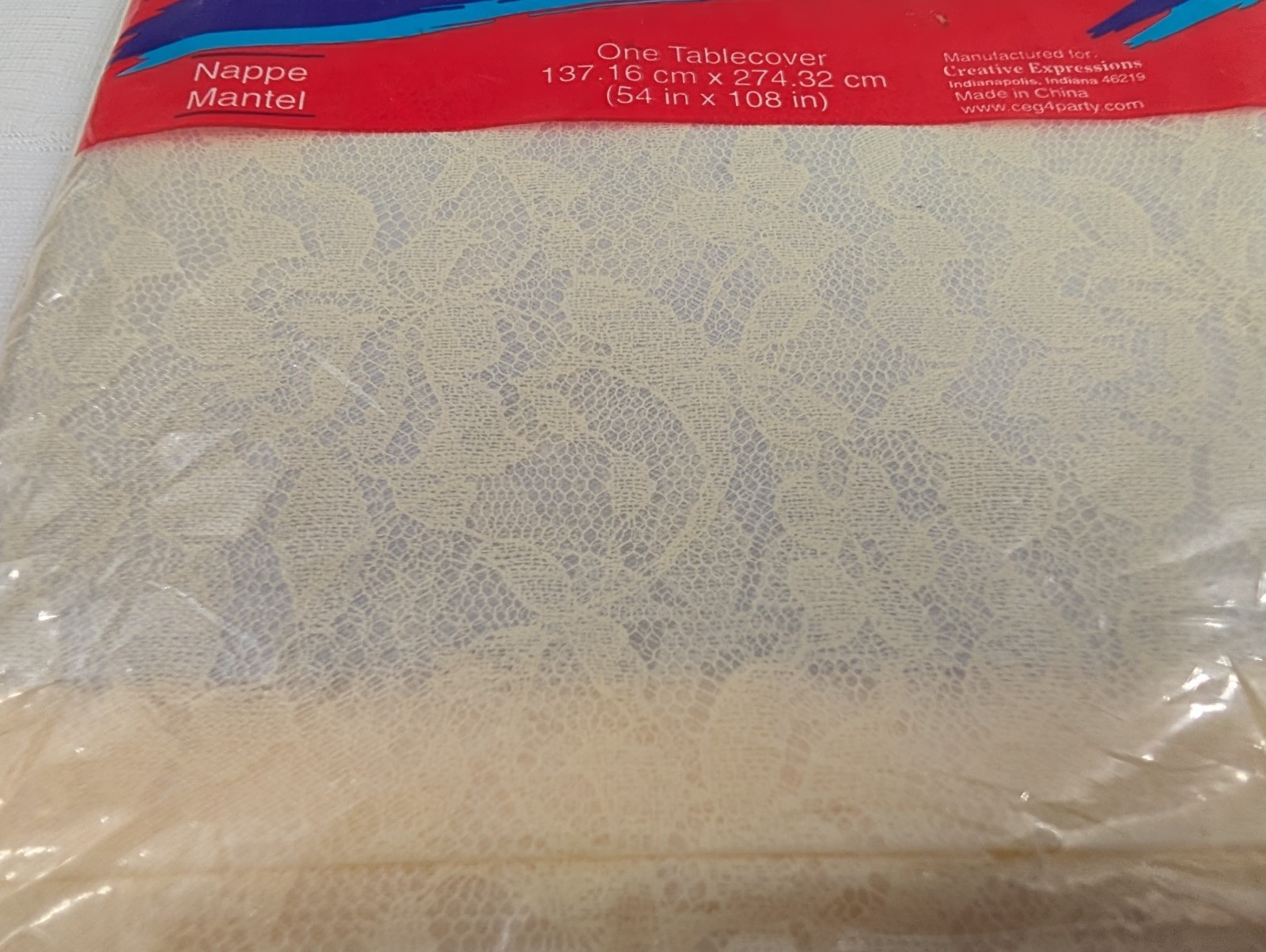 Creative Expression Paper Art Printed Lace Plastic Tablecover 54″x108″ NIP Cream