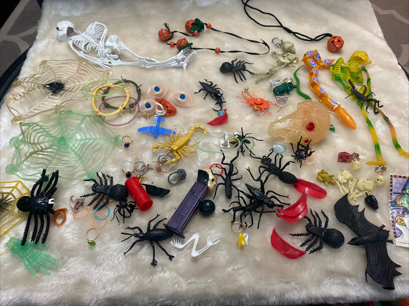 Halloween Toy Trinket Lot Skeletons Bats Spiders Pez Skull