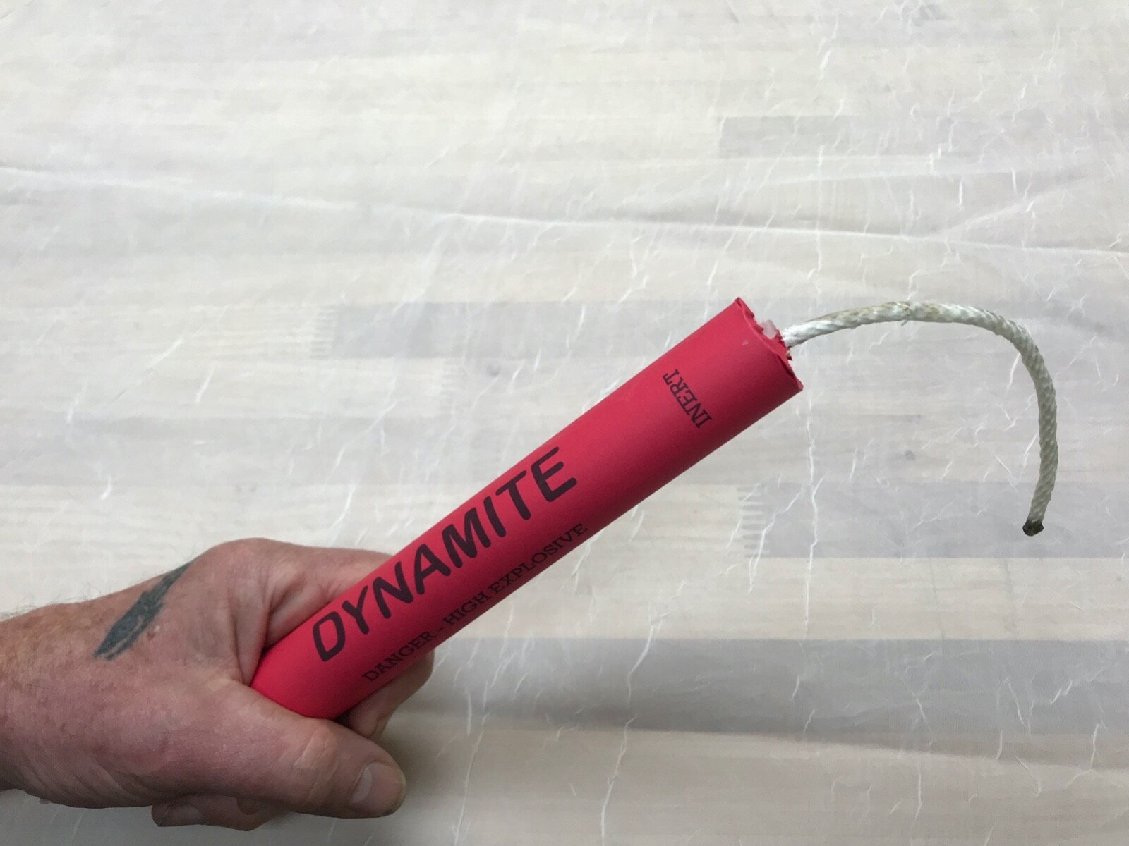 fake dynamite stick with “fuse”. movie prop, display, gag gift
