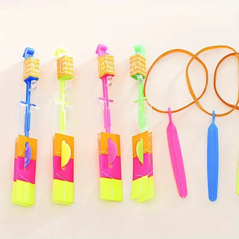 10Pcs LED Light Rockets Flying Toys Slingshot Launcher Birthday Halloween Christ